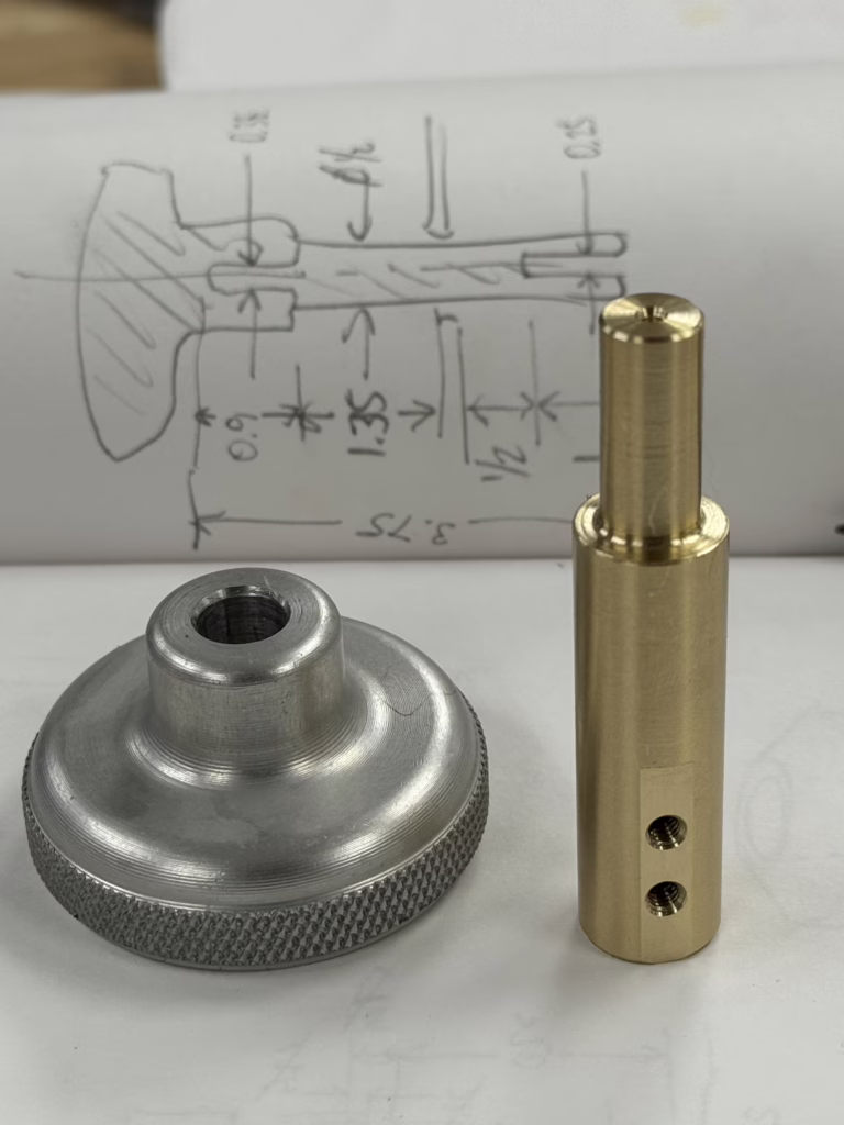 Finished brass leadscrew adapter part